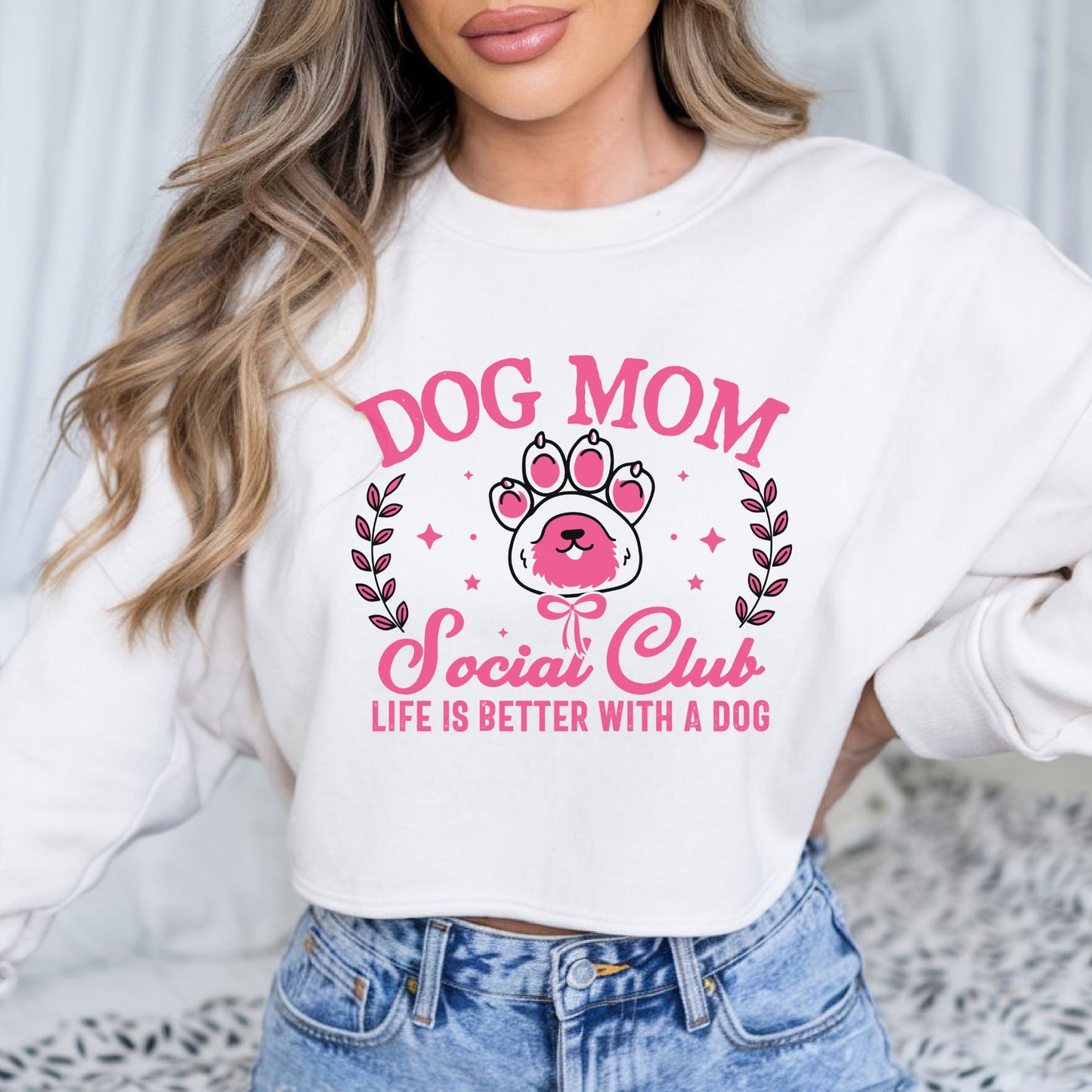 Cute pink Dog Mom Social Club design featuring a dog paw print and the phrase Life Is Better With A Dog, perfect for dog moms, pet lovers, and puppy owners
