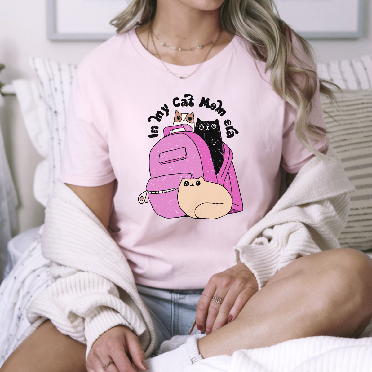 In My Cat Mom Era DTF transfer pressed on pastel pink graphic t-shirt mockup