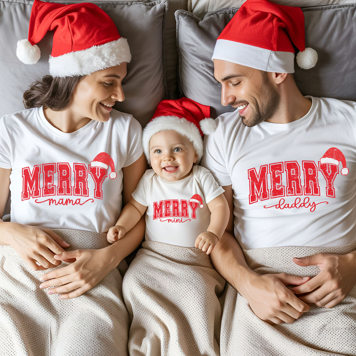 Matching family Christmas shirt mockup featuring Merry Mama, Merry Daddy and Merry Mini designs in distressed red varsity lettering with Santa hats on white shirts.