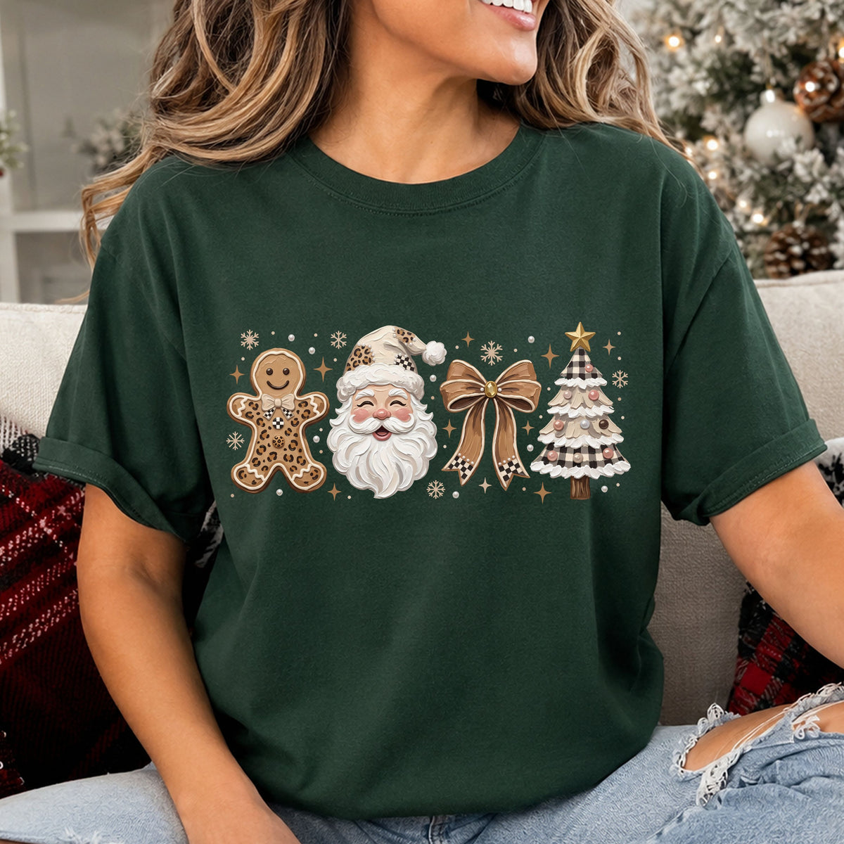 Neutral Christmas DTF transfer featuring a leopard-print gingerbread man, Santa face, brown bow and cream Christmas tree with black and cream checks and snowflakes.