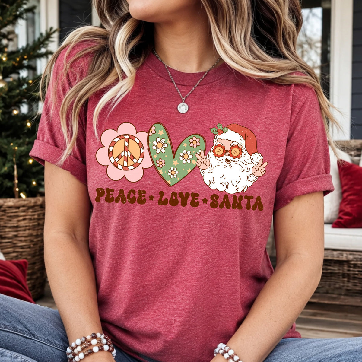 Peace Love Santa lettering beneath a pink flower with a peppermint-striped peace symbol, a sage green floral heart and Santa wearing flower sunglasses and making two peace signs.