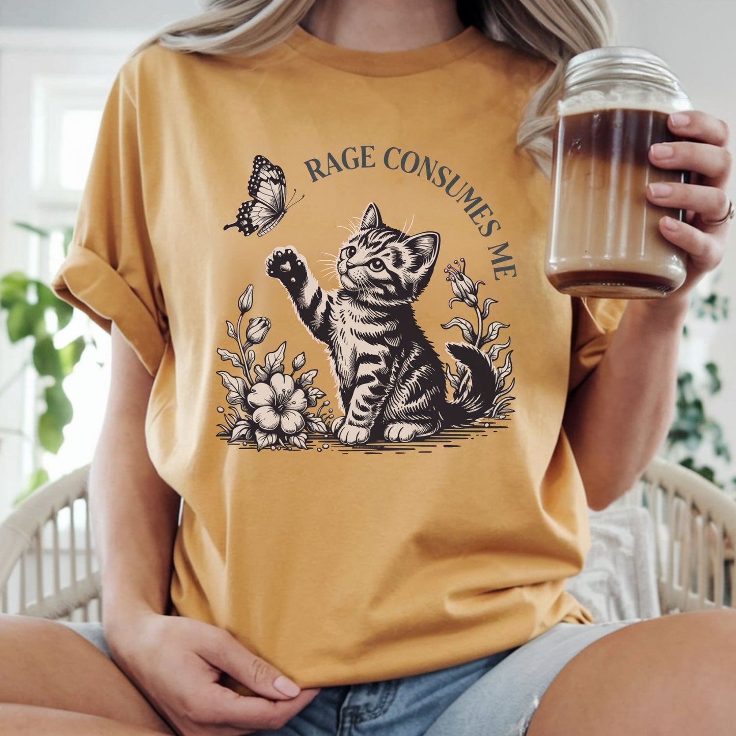 Funny cat design featuring a kitten reaching for a butterfly with the phrase Rage Consumes Me, perfect for cat lovers, sarcastic humor fans, introverts, and pet parents