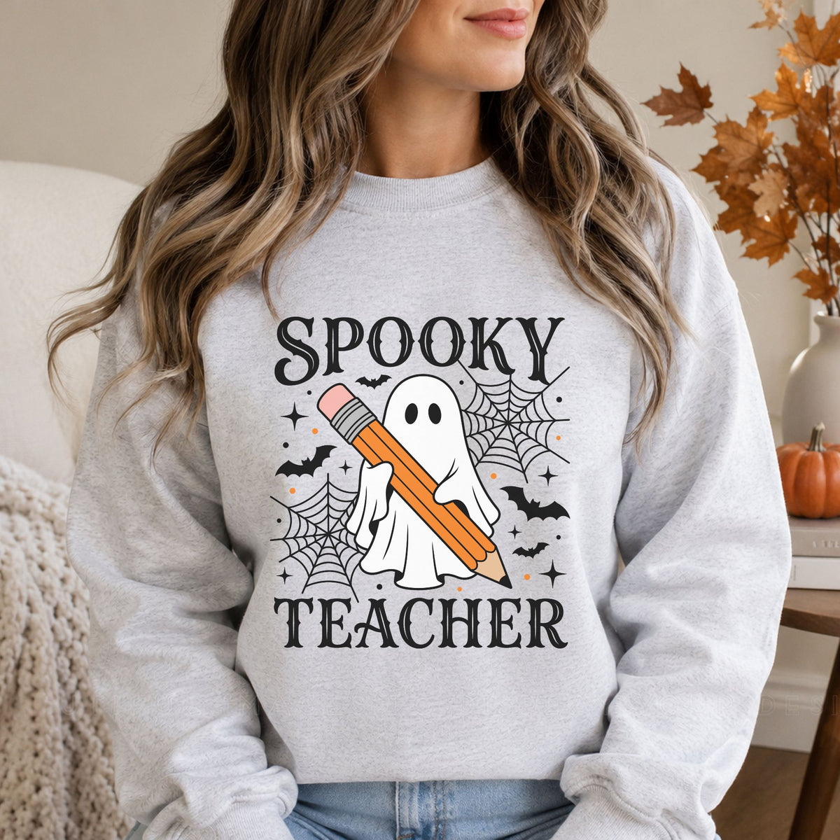 Spooky Teacher Halloween DTF transfer featuring a cute white ghost holding a large orange pencil with black spiderwebs, bats, stars, and orange accents.