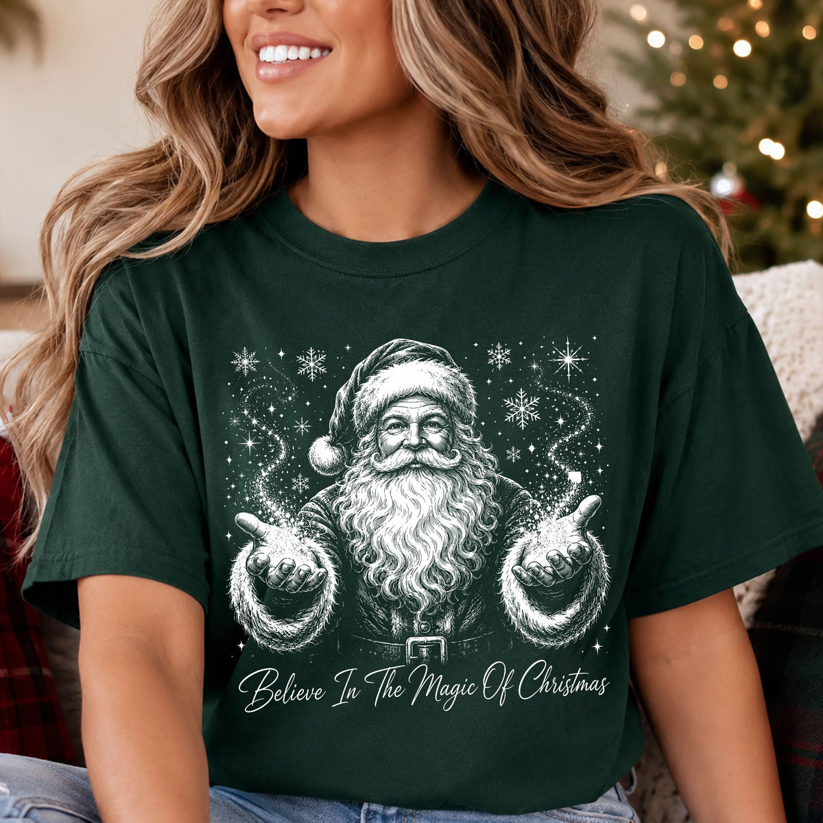 Believe in the Magic of Christmas DTF transfer in white line art, featuring Santa with outstretched hands, swirling stars, snowflakes and script lettering.