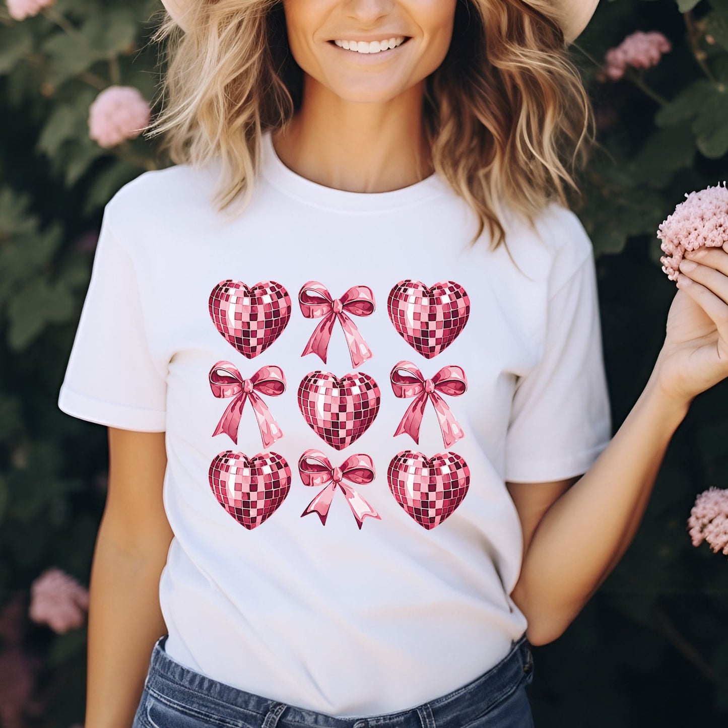 Pink coquette disco hearts and bows graphic design on white t-shirt mockup ready to press DTF transfer