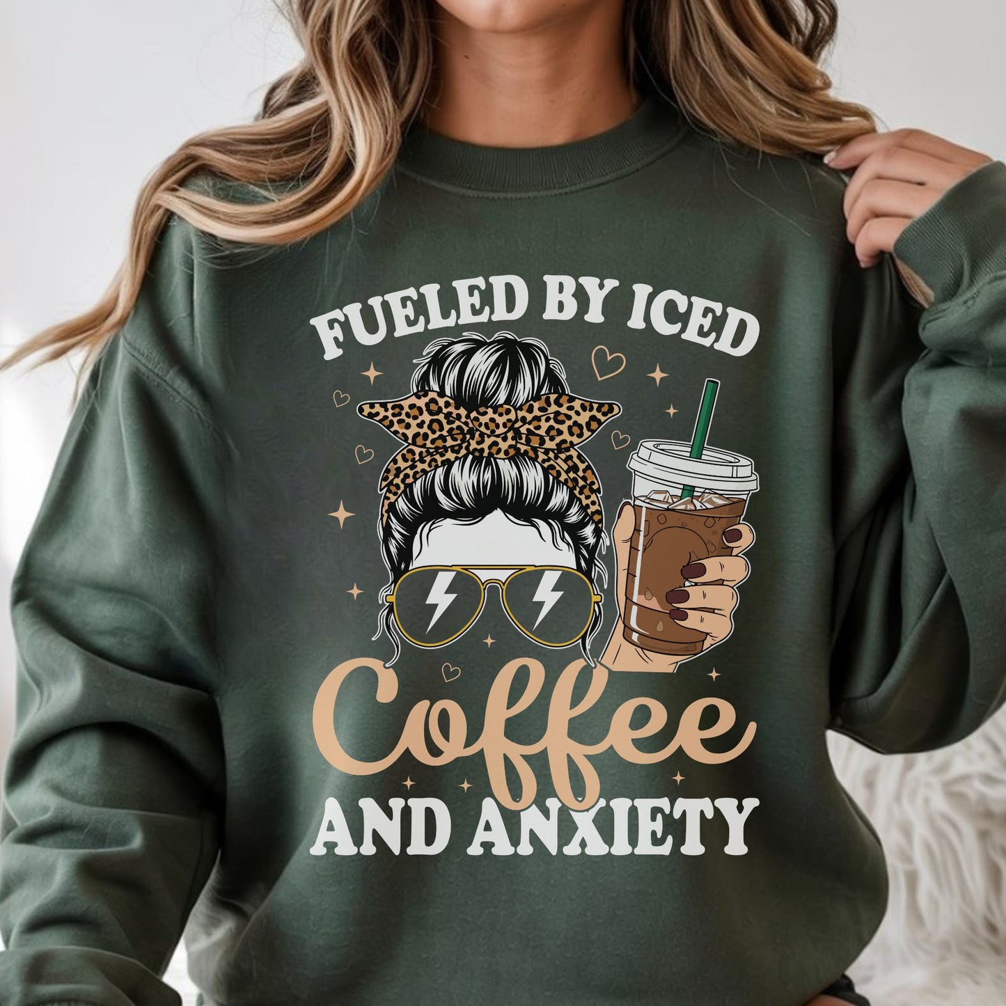 Fueled by iced coffee and anxiety DTF transfer with leopard bow messy bun, iced coffee cup, and lightning bolt sunglasses
