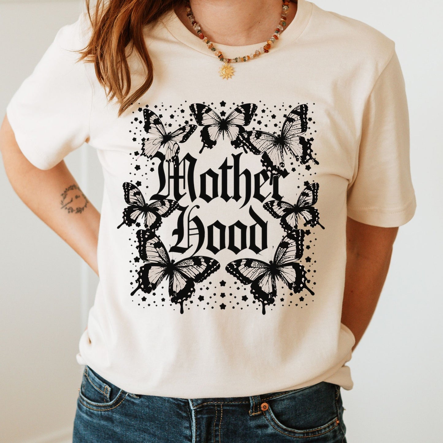 Gothic motherhood DTF transfer with black butterflies, grunge gothic lettering, and dark feminine aesthetic