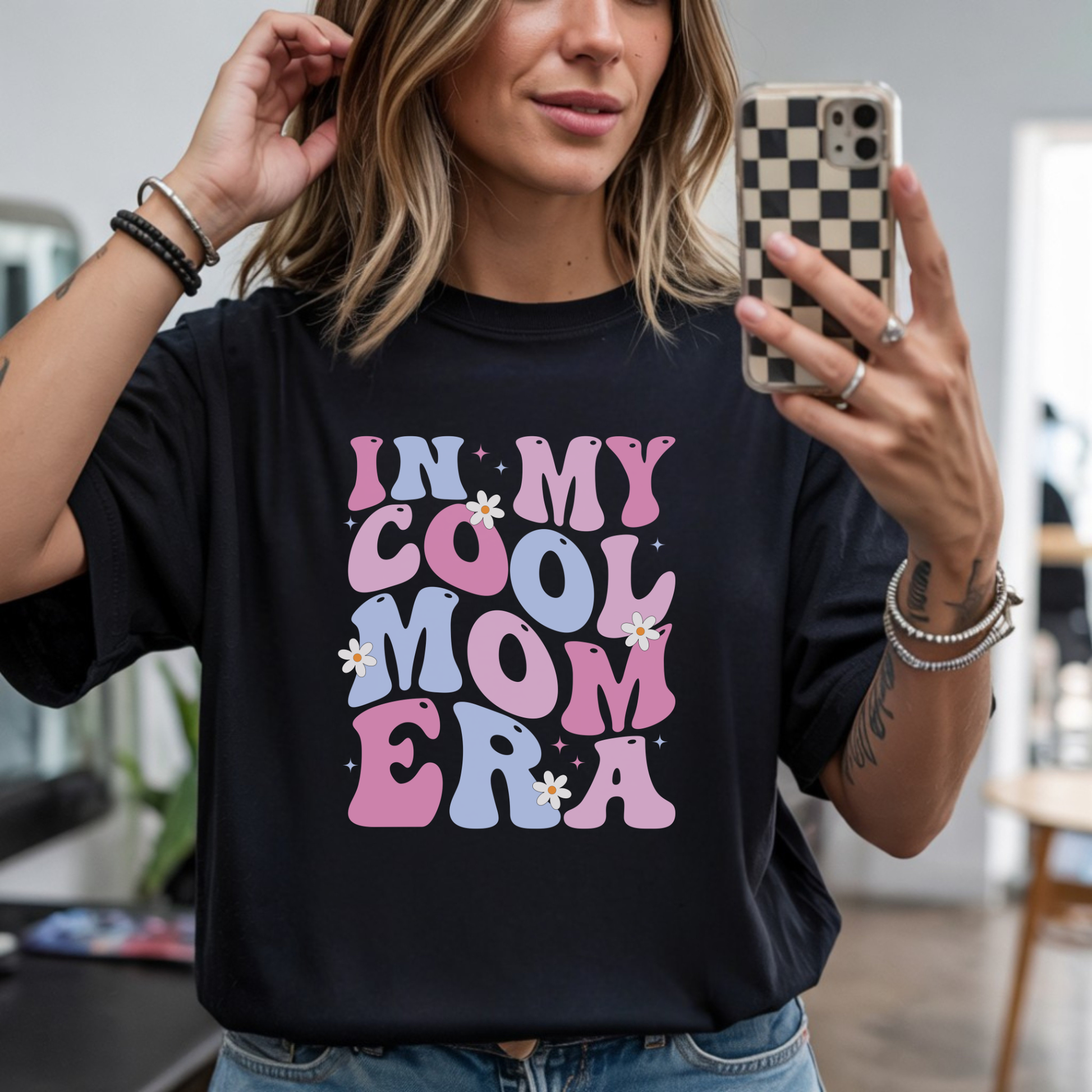 In my cool mom era pink and purple retro graphic design on black t-shirt mockup ready to press DTF transfer