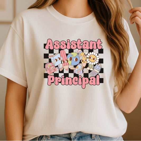 Cute Assistant Principal design featuring pink retro lettering, a black-and-white checkerboard background, smiling school supplies, globe, books, pencils, backpacks, calculator, and daisy accents.