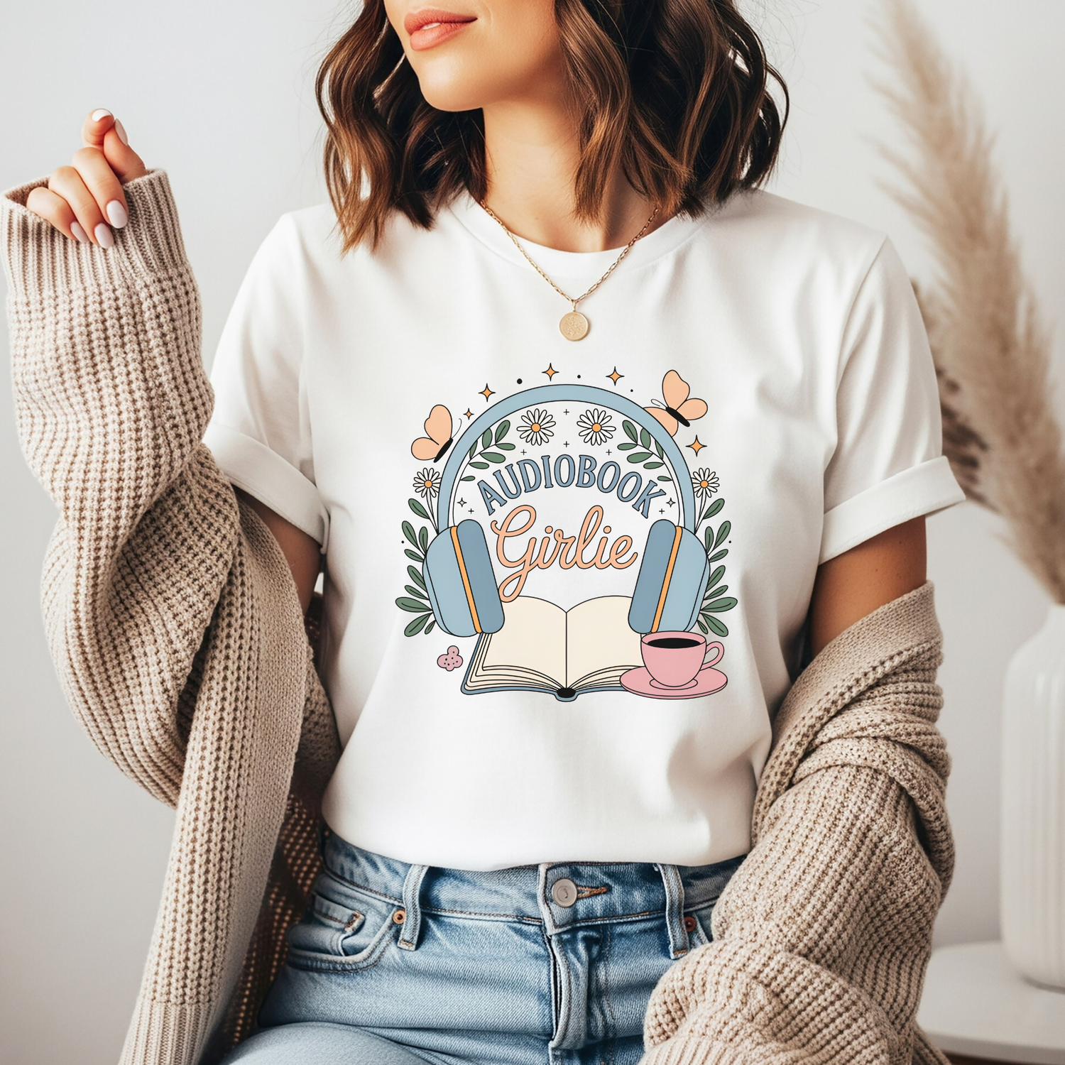 Audiobook Girlie DTF transfer design pressed on a unisex graphic t-shirt mockup for book lovers