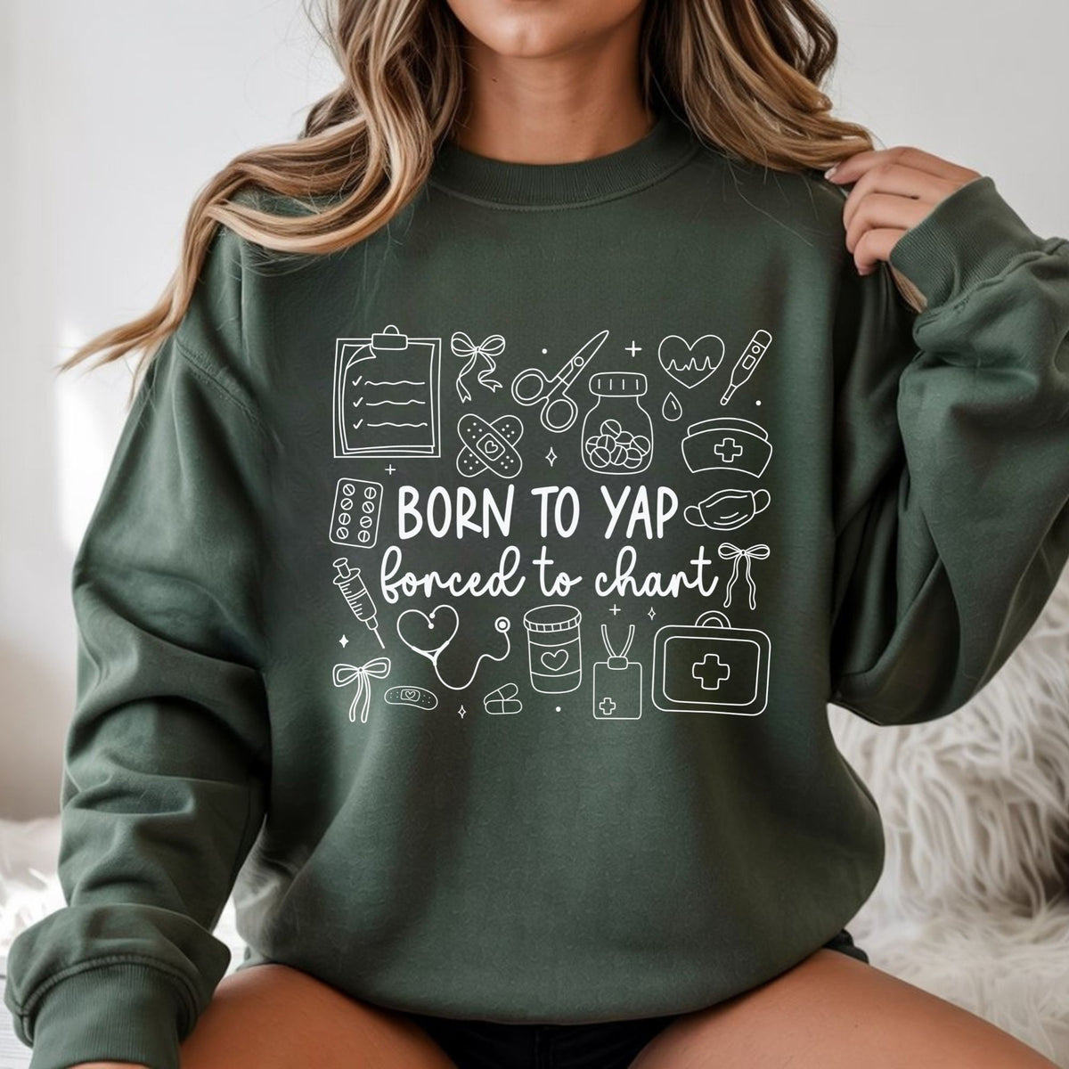 Born to Yap Forced to Chart white DTF transfer featuring white hand-drawn medical icons including a stethoscope, syringe, pills, thermometer, nurse cap, clipboard, bandages, and bows for funny nurse shirts, healthcare sweatshirts, and medical staff apparel.