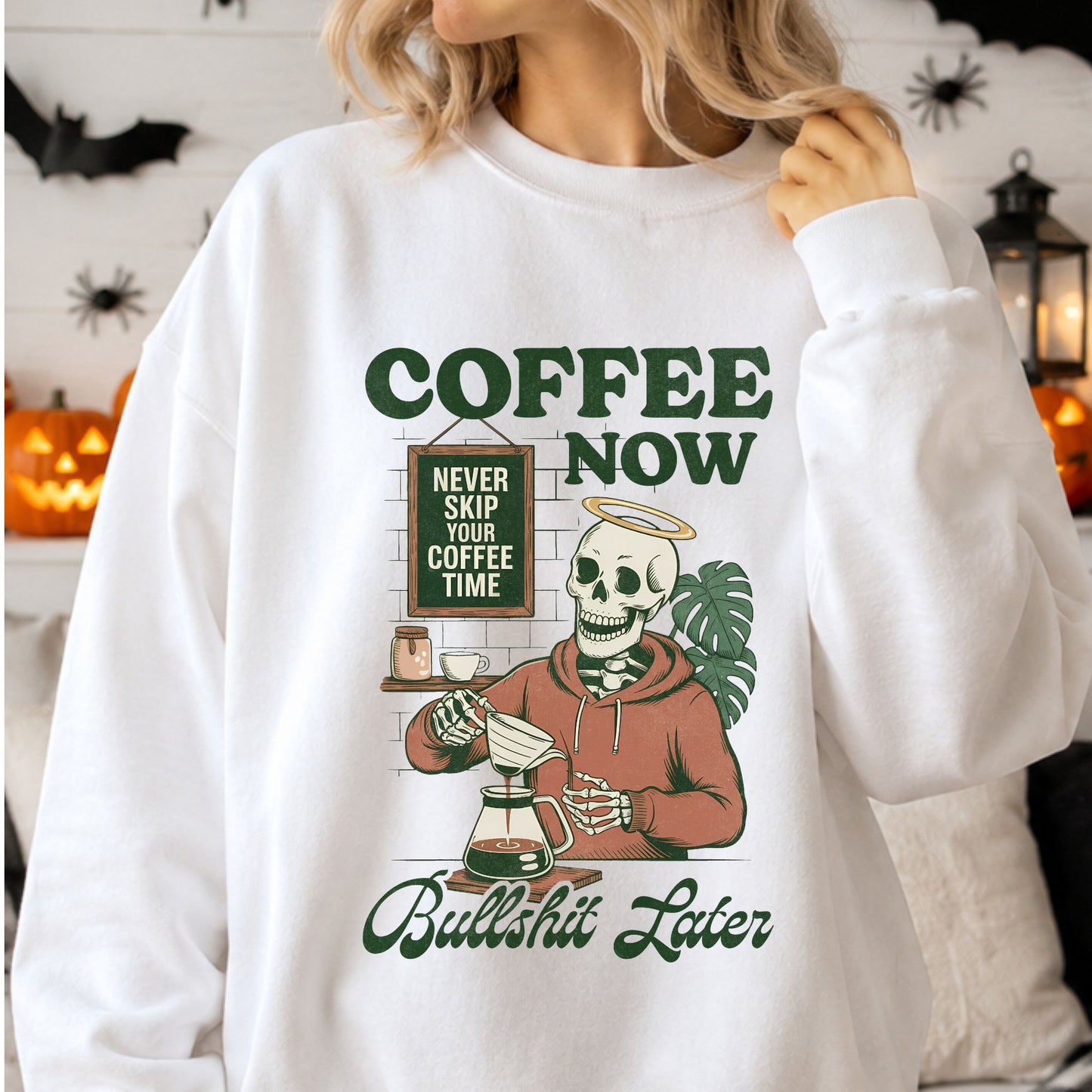 Coffee Now, Bullshit Later DTF transfer featuring a haloed skeleton barista making pour-over coffee beside the phrase Never Skip Your Coffee Time, displayed on a white sweatshirt mockup.