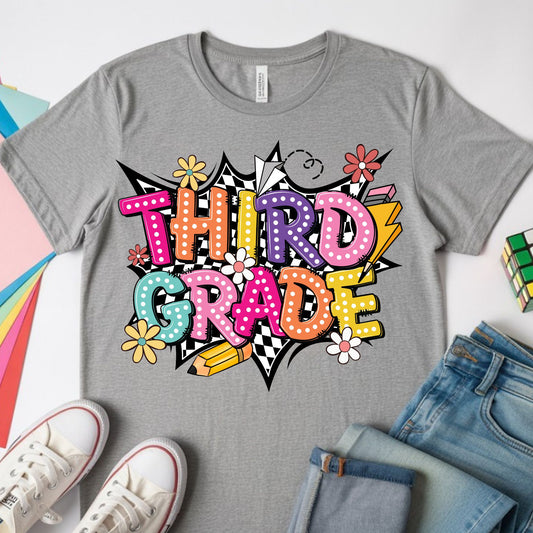 Colorful Third Grade back-to-school design featuring bright bubble letters, black-and-white checkerboard accents, flowers, a pencil, paper airplane, lightning bolt, and playful school graphics.