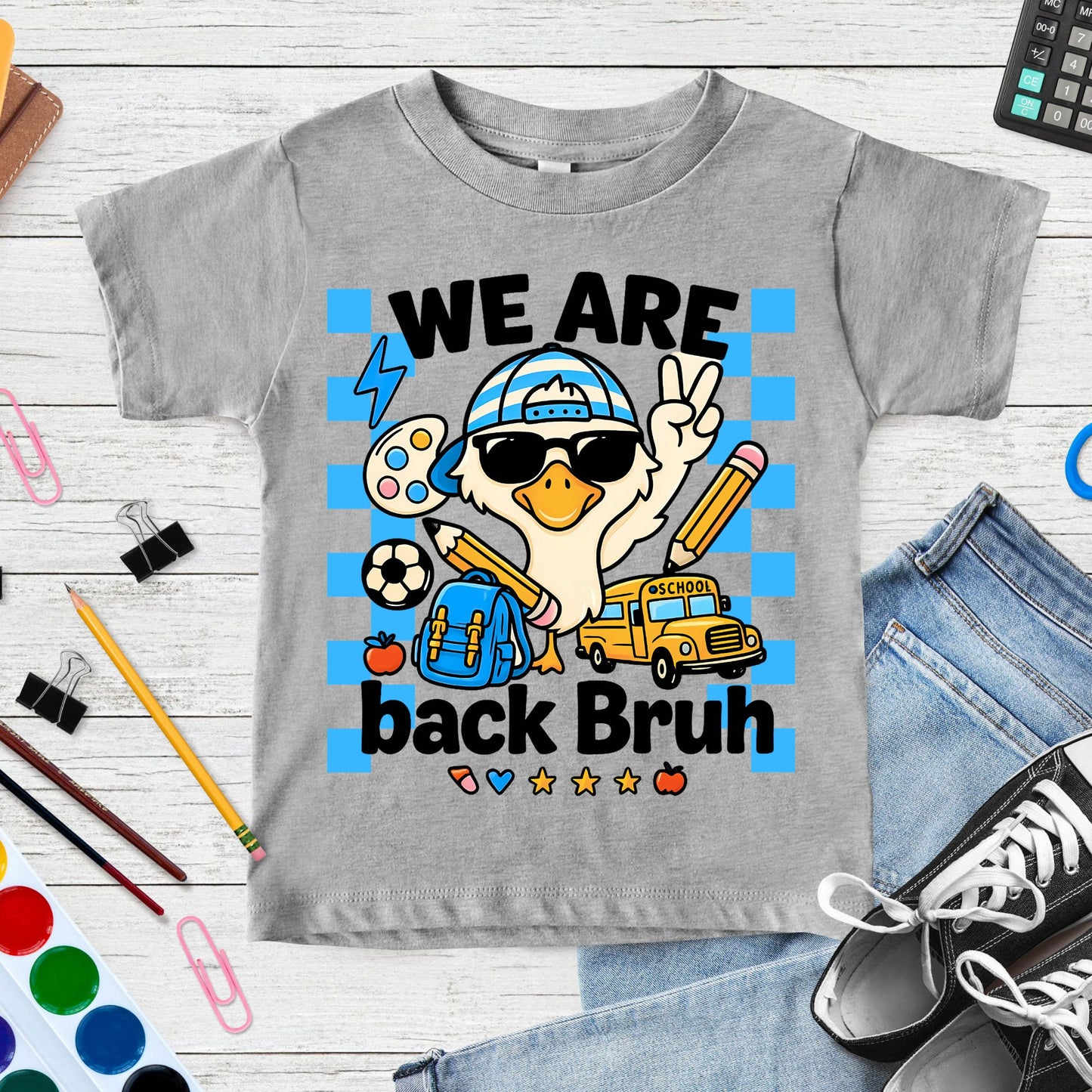 We Are Back Bruh back-to-school design featuring a cool goose wearing sunglasses and a striped cap with a backpack, pencils, school bus, soccer ball, paint palette, apple, and blue checkerboard accents.
