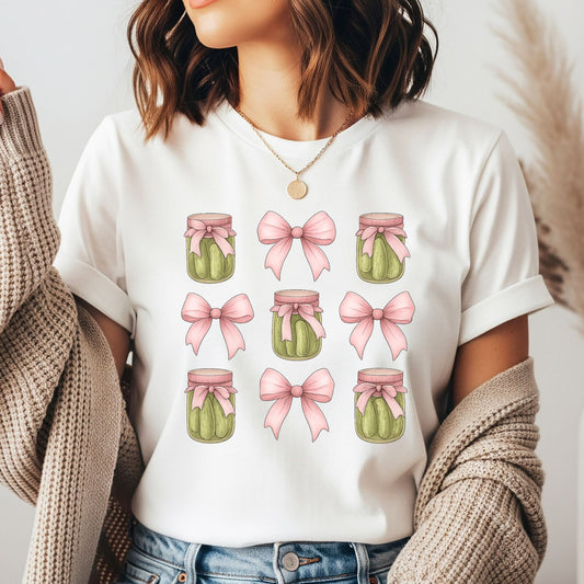 Coquette pickle jar DTF transfer featuring green pickle jars tied with soft pink bows and matching oversized pink ribbon bows, perfect for pickle lover shirts, sweatshirts, tote bags, and cute coquette graphic apparel.
