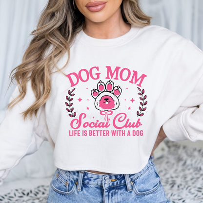 Cute pink Dog Mom Social Club design featuring a dog paw print and the phrase Life Is Better With A Dog, perfect for dog moms, pet lovers, and puppy owners