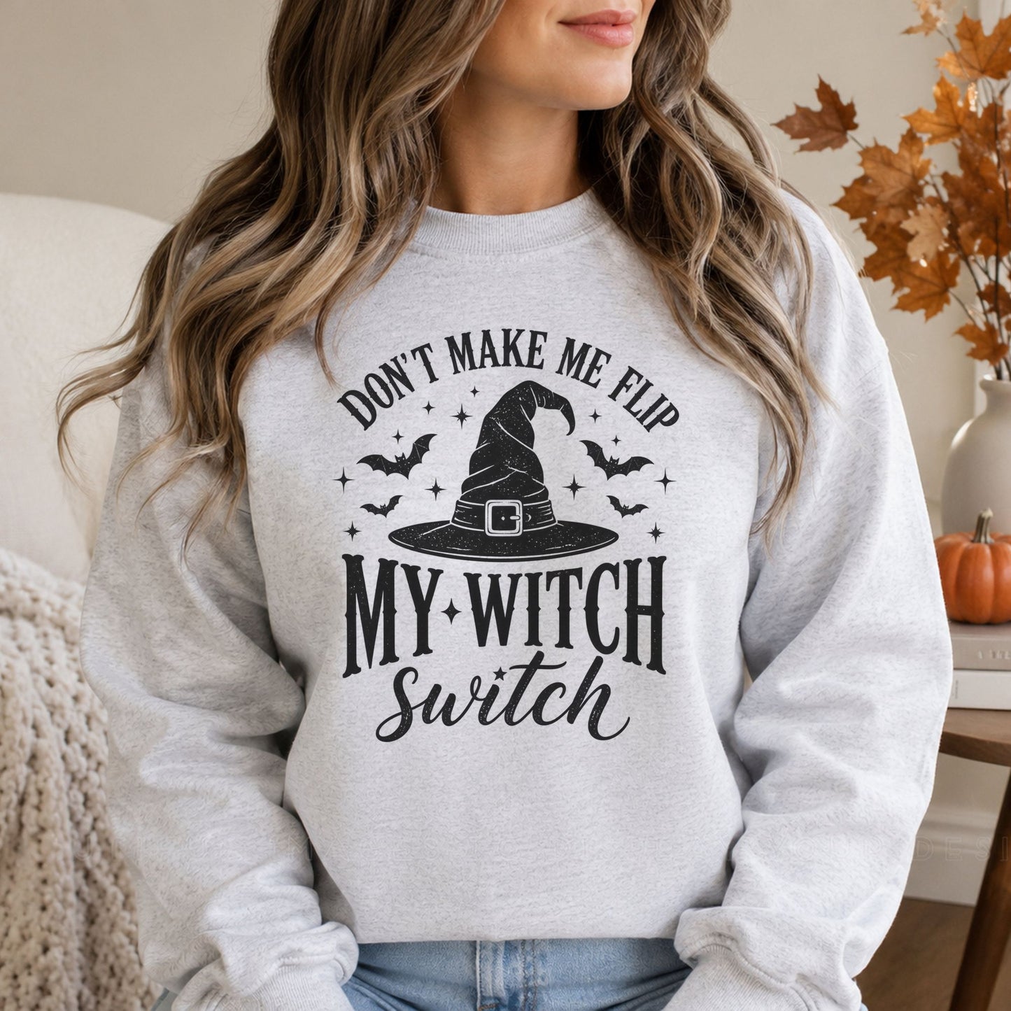 Black-and-white Halloween DTF transfer featuring a vintage witch hat, flying bats and sparkling stars with the phrase Don’t Make Me Flip My Witch Switch, displayed on a gray sweatshirt mockup.