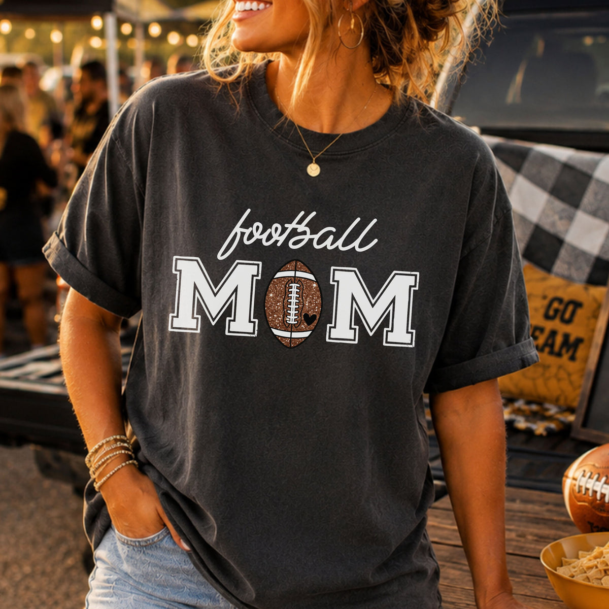 Football Mom DTF transfer white text version featuring white Football Mom lettering, bold varsity MOM letters, and a brown glitter football with black heart detail.