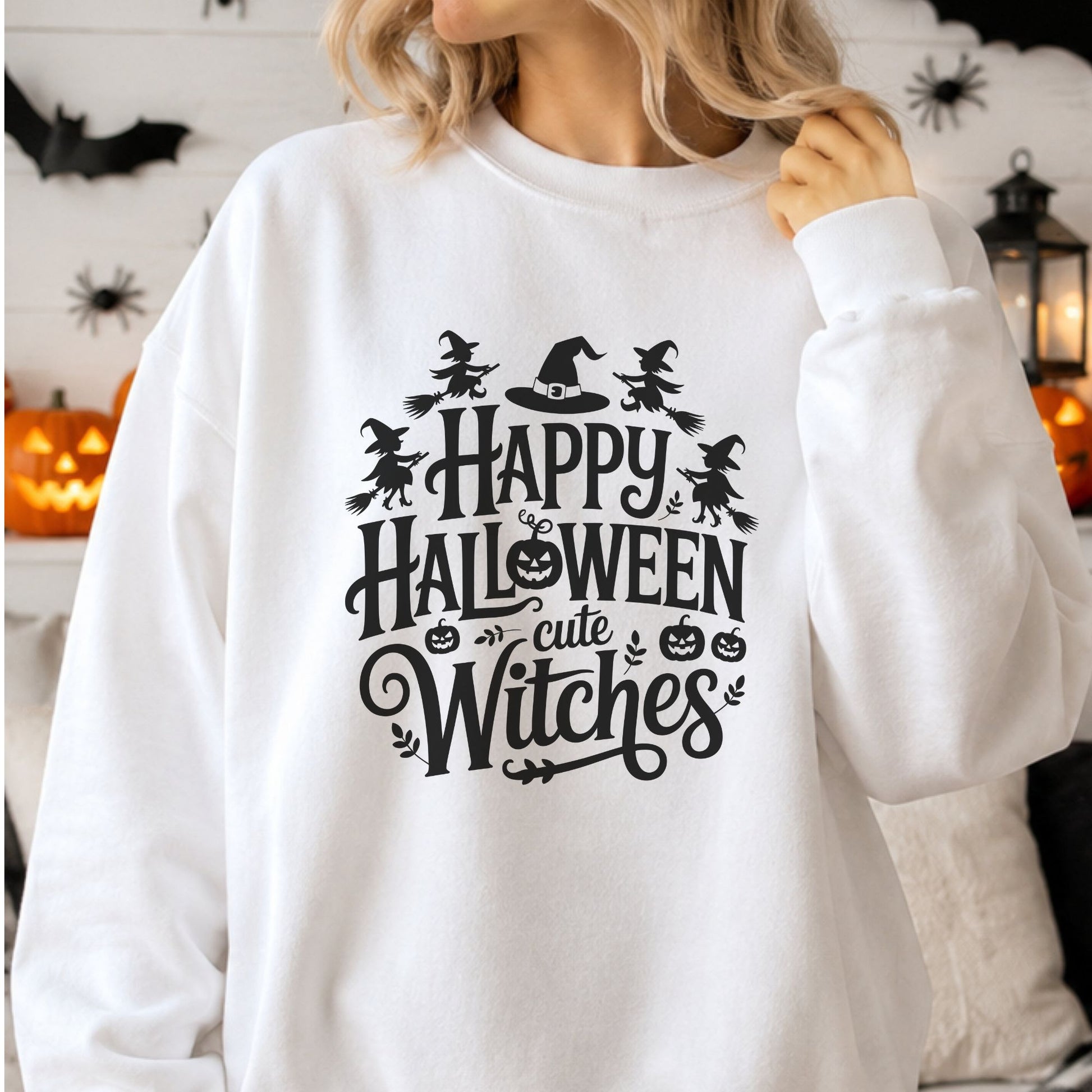 Black Happy Halloween Cute Witches DTF transfer featuring four witches flying on broomsticks, a classic witch hat, jack-o-lanterns and decorative leafy accents on a white sweatshirt mockup.