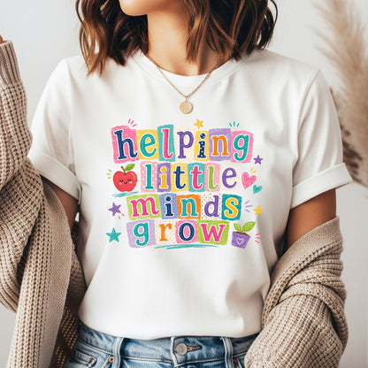 Helping Little Minds Grow teacher design featuring bright colorful block lettering, a smiling apple, hearts, stars, and a small potted plant in a cheerful classroom style.