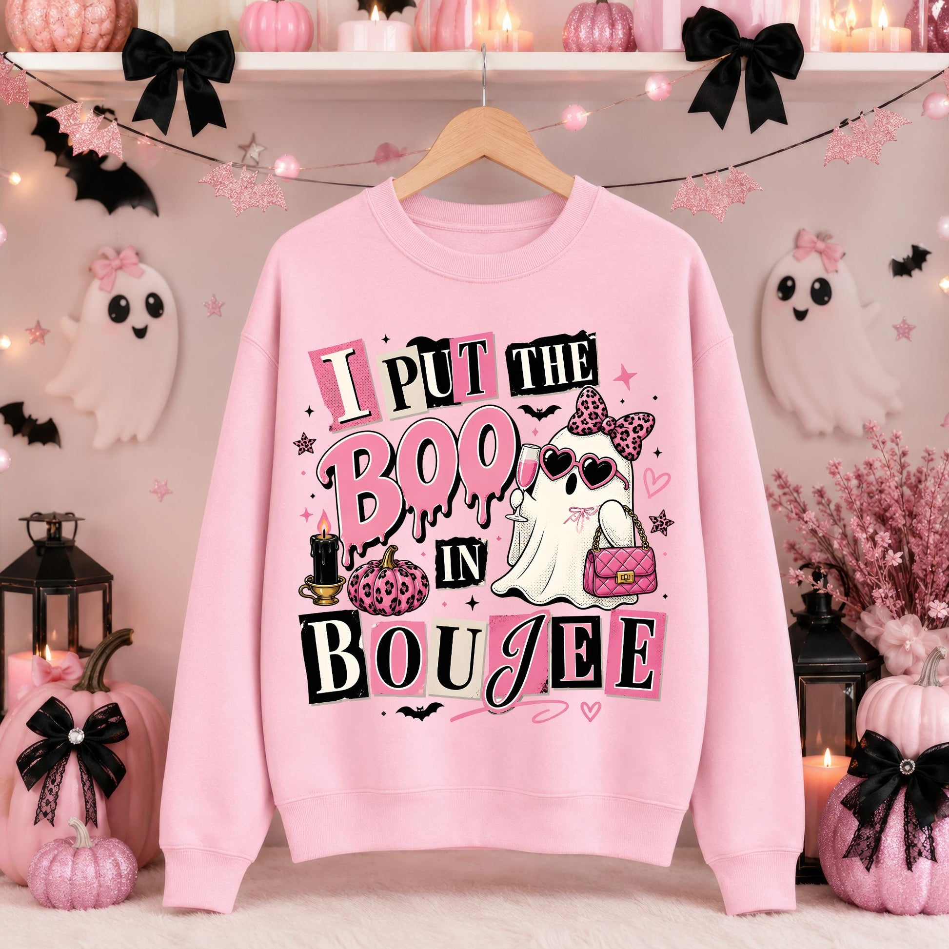 Pink sweatshirt mockup featuring a coquette ghost with sunglasses, a pink bow, handbag, and the phrase I Put the Boo in Boujee in a cute Halloween design.