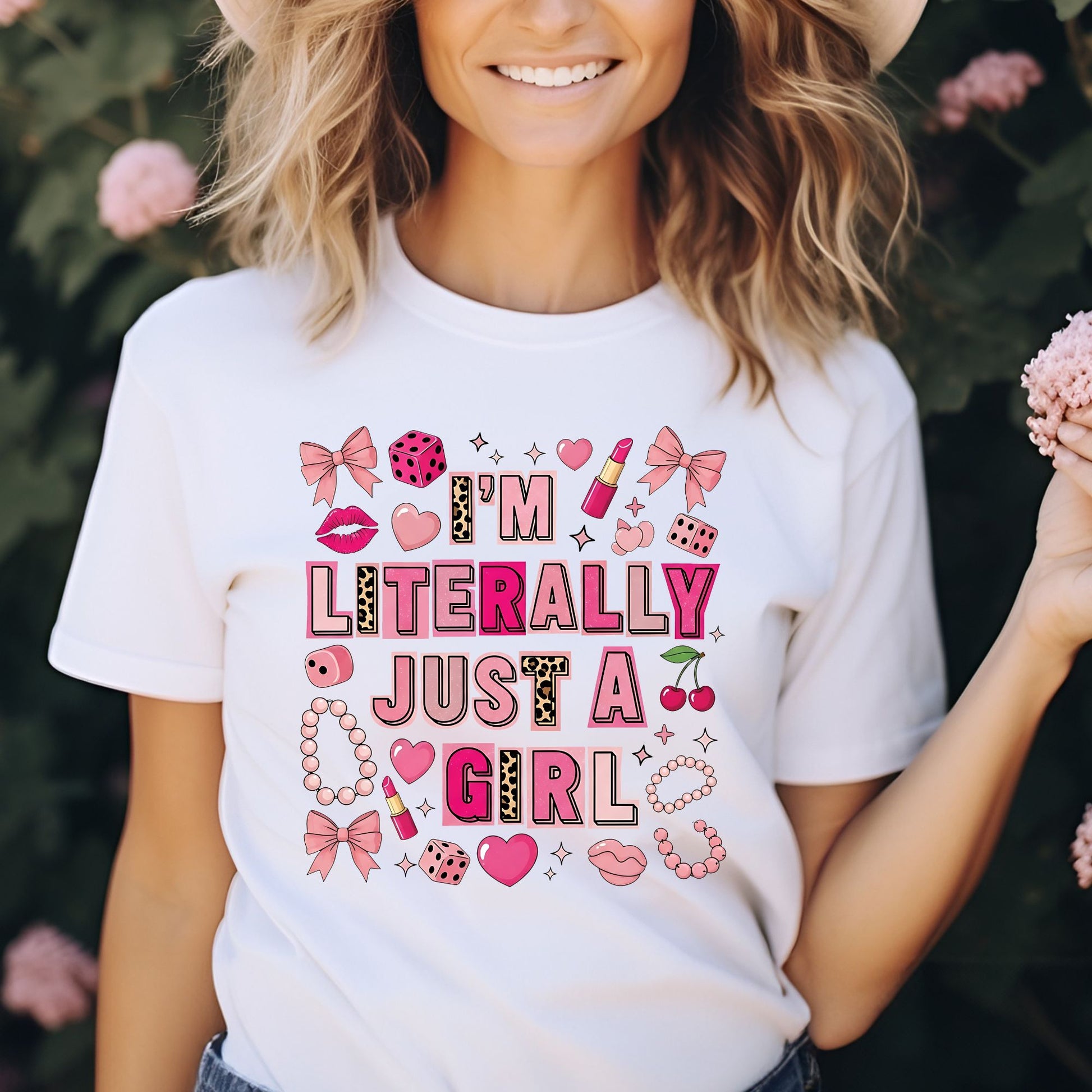 Trendy coquette graphic featuring the phrase "I'm Literally Just a Girl" surrounded by pink bows, lipstick, hearts, cherries, pearls, dice, and feminine icons. Perfect for aesthetic graphic tees, hoodies, and girly fashion.

