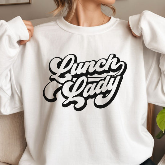 Lunch Lady DTF transfer featuring bold retro script lettering in a clean black and cream design for cafeteria staff shirts and school apparel.