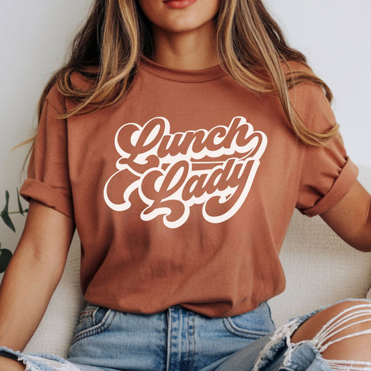 Lunch Lady design featuring bold white retro script lettering with a clean vintage look for cafeteria staff shirts, school food service apparel, and lunch crew gifts.