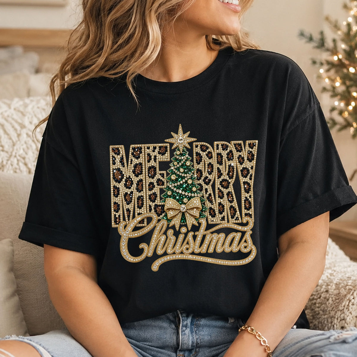 Merry Christmas DTF transfer with gold faux rhinestone script, leopard-print block letters, an emerald green Christmas tree, gold bow and star topper.