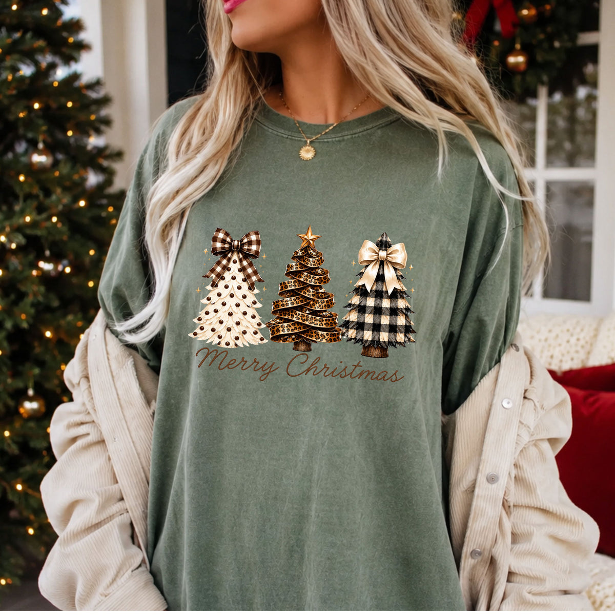 “Merry Christmas” in brown script beneath three trees: cream with brown dots and a gingham bow, leopard ribbon with a gold star, and black and cream plaid with an ivory bow.