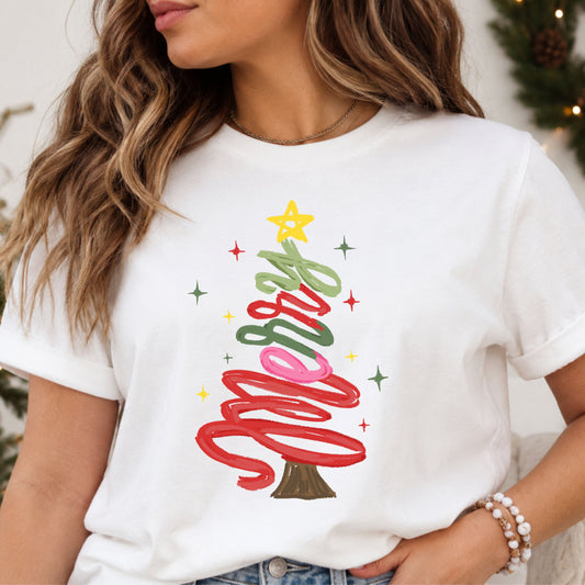 “Merry” in red, pink and green textured script arranged as a Christmas tree, topped with a yellow star and surrounded by colorful sparkles.
