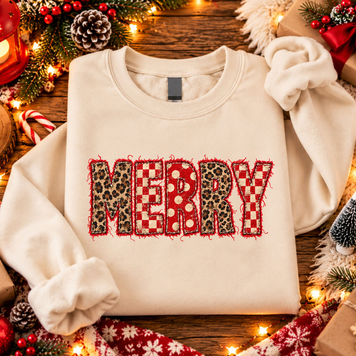 MERRY in leopard print, red and cream gingham and polka dot letters, with printed stitch details and a frayed red fabric effect.