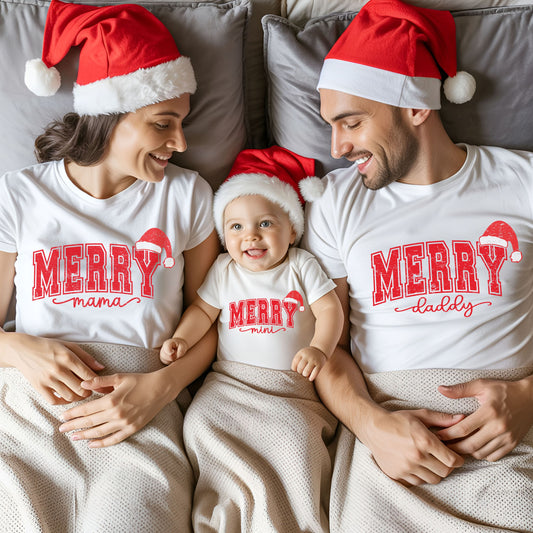 Matching family Christmas shirt mockup featuring Merry Mama, Merry Daddy and Merry Mini designs in distressed red varsity lettering with Santa hats on white shirts.