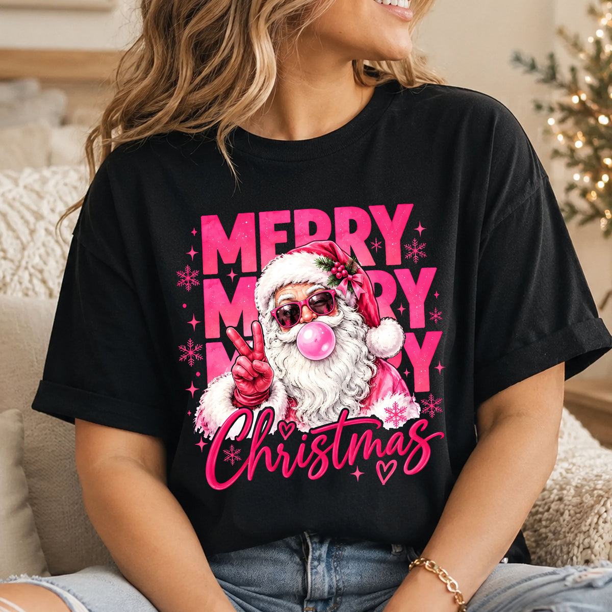 Pink Santa wearing sunglasses, blowing bubblegum and giving a peace sign, with “Merry Merry Merry Christmas” lettering, pink snowflakes, stars and hearts.