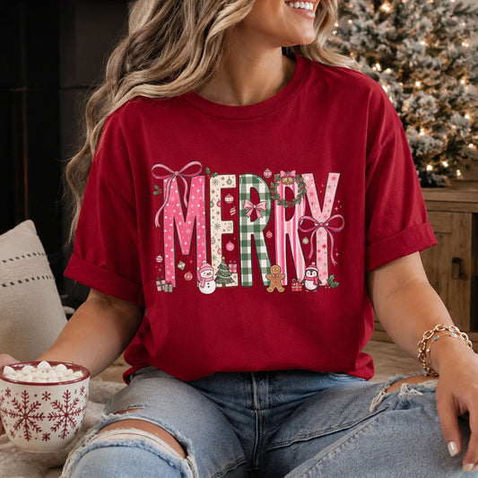 “Merry” in pink patterned, cream ornament-print and green gingham letters, with pink bows, a wreath, snowman, gingerbread cookie, penguin and gifts.