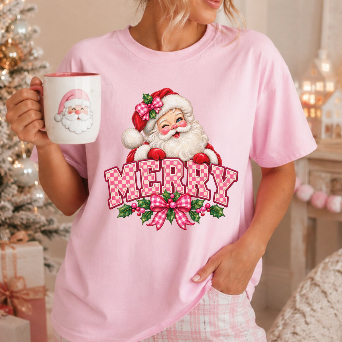 “Merry” in pink and cream checkered varsity letters beneath a winking Santa in a red hat, with matching gingham bows, green holly and pink berries.