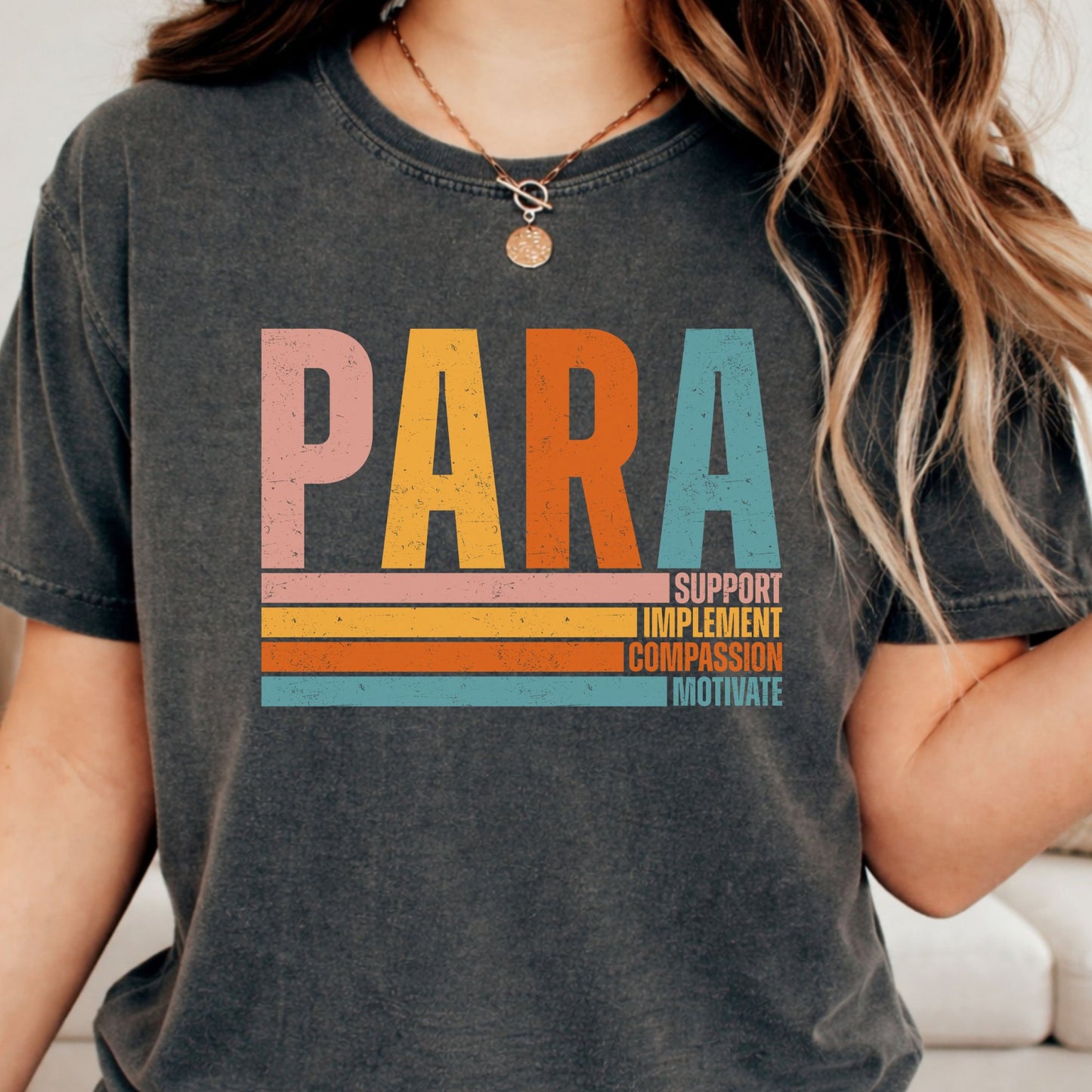 Retro PARA design featuring distressed pink, mustard, orange, and teal lettering with the words Support, Implement, Compassion, and Motivate for paraprofessionals and school support staff.