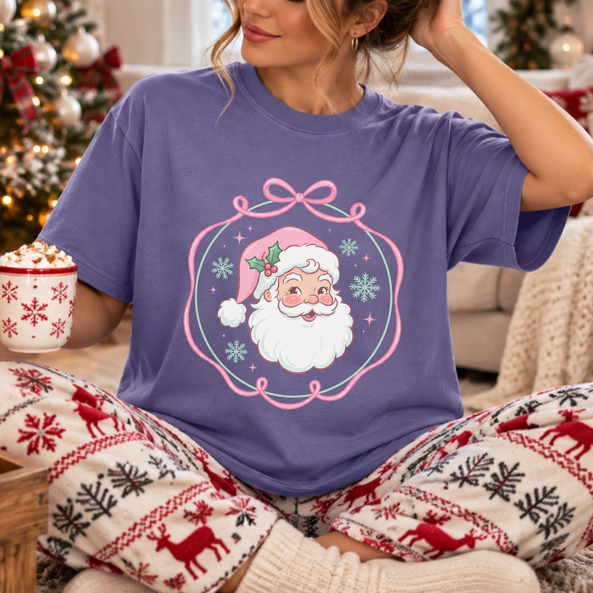 Smiling Santa in a pink hat with holly, surrounded by mint snowflakes and pink sparkles inside a mint oval border with a pink ribbon bow frame.