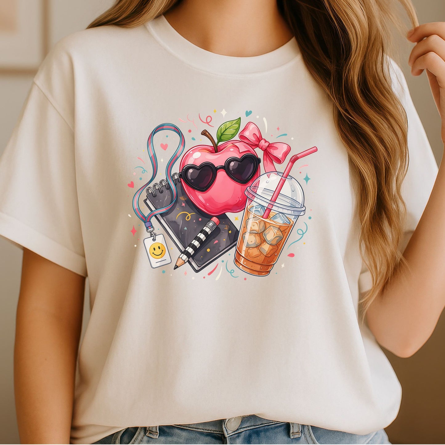 Pink teacher essentials design featuring a glossy apple wearing heart-shaped sunglasses, a large bow, iced coffee, notebook, checkerboard pencil, school lanyard, smiley badge, hearts, sparkles, and colorful classroom accents.