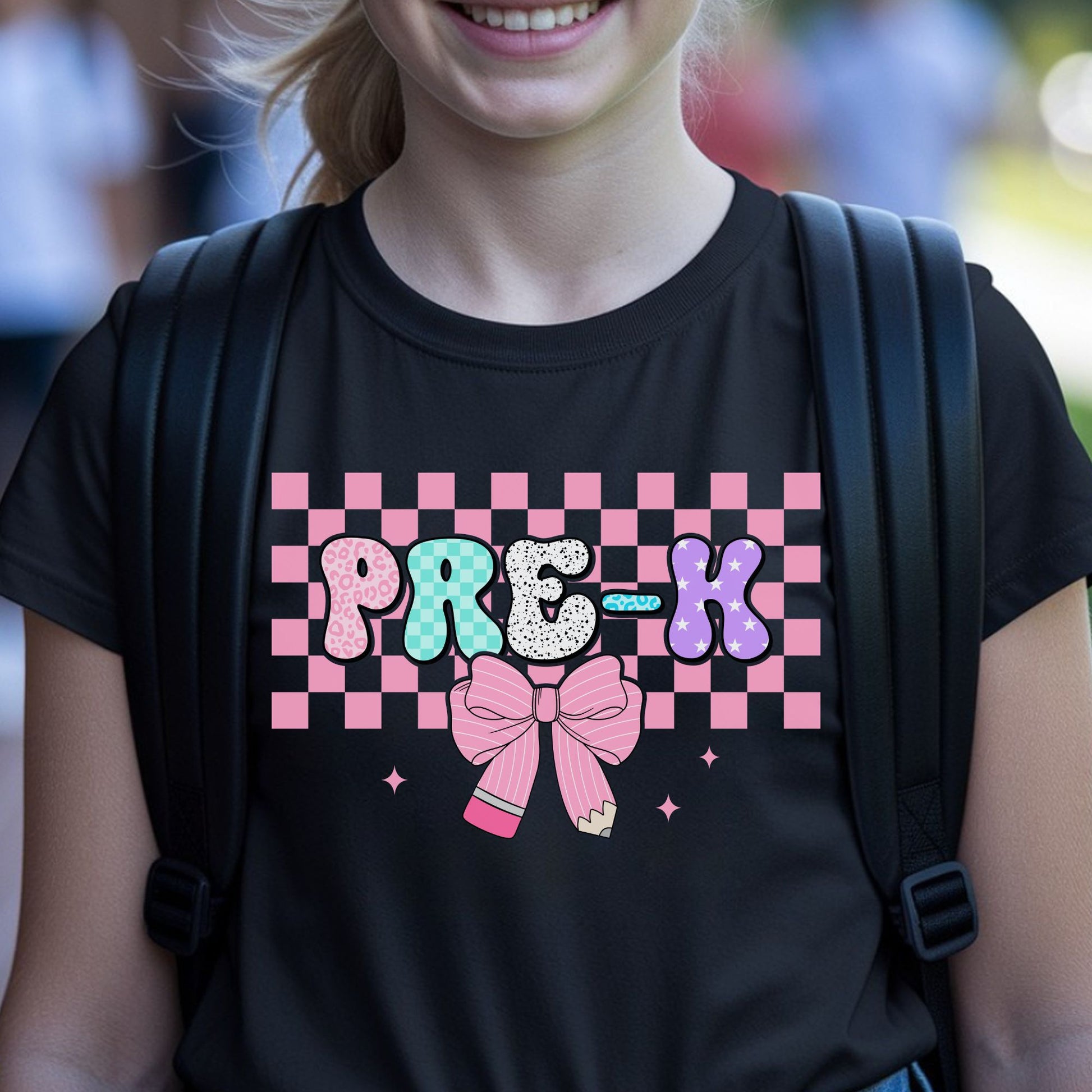 Pre-K back-to-school design featuring colorful patterned bubble letters, a pink checkerboard background, pencil bow, sparkles, leopard print, stars, and playful preschool style.