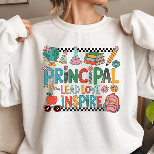 Colorful principal design featuring Lead Love Inspire lettering with a globe, science beakers, books, pencil, apple, backpack, flowers, sunglasses, and checkerboard accents.