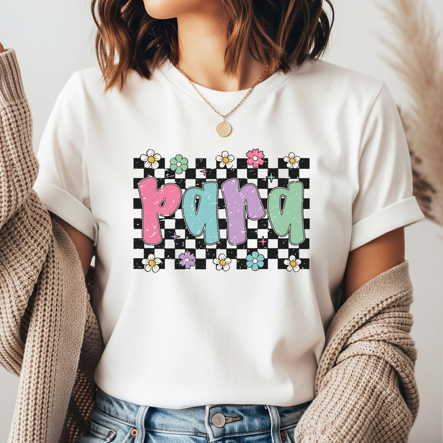 Retro PARA design featuring distressed pastel lettering, a black-and-white checkerboard background, colorful flowers, daisies, and playful classroom support staff style.