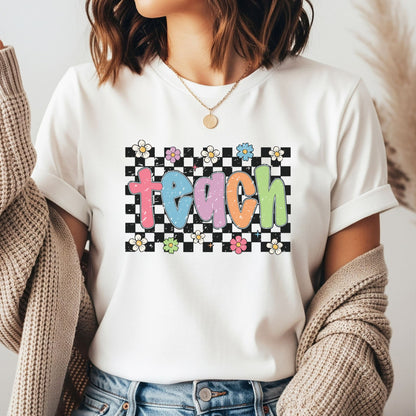 Retro Teach design featuring distressed pastel lettering, a black and white checkerboard background, colorful flowers, daisies, and playful classroom style.