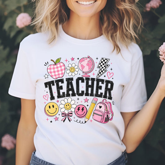 Retro Teacher design featuring distressed black lettering with a pink gingham apple, globe, checkerboard lightning bolt, smiley faces, daisies, pencil, backpack, bows, hearts, and playful school icons.