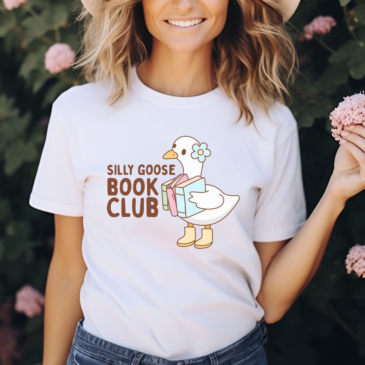 Silly Goose Book Club DTF transfer featuring a cute white goose holding pastel books with a blue flower and yellow rain boots, perfect for book lover shirts, reader sweatshirts, tote bags, and book club apparel.