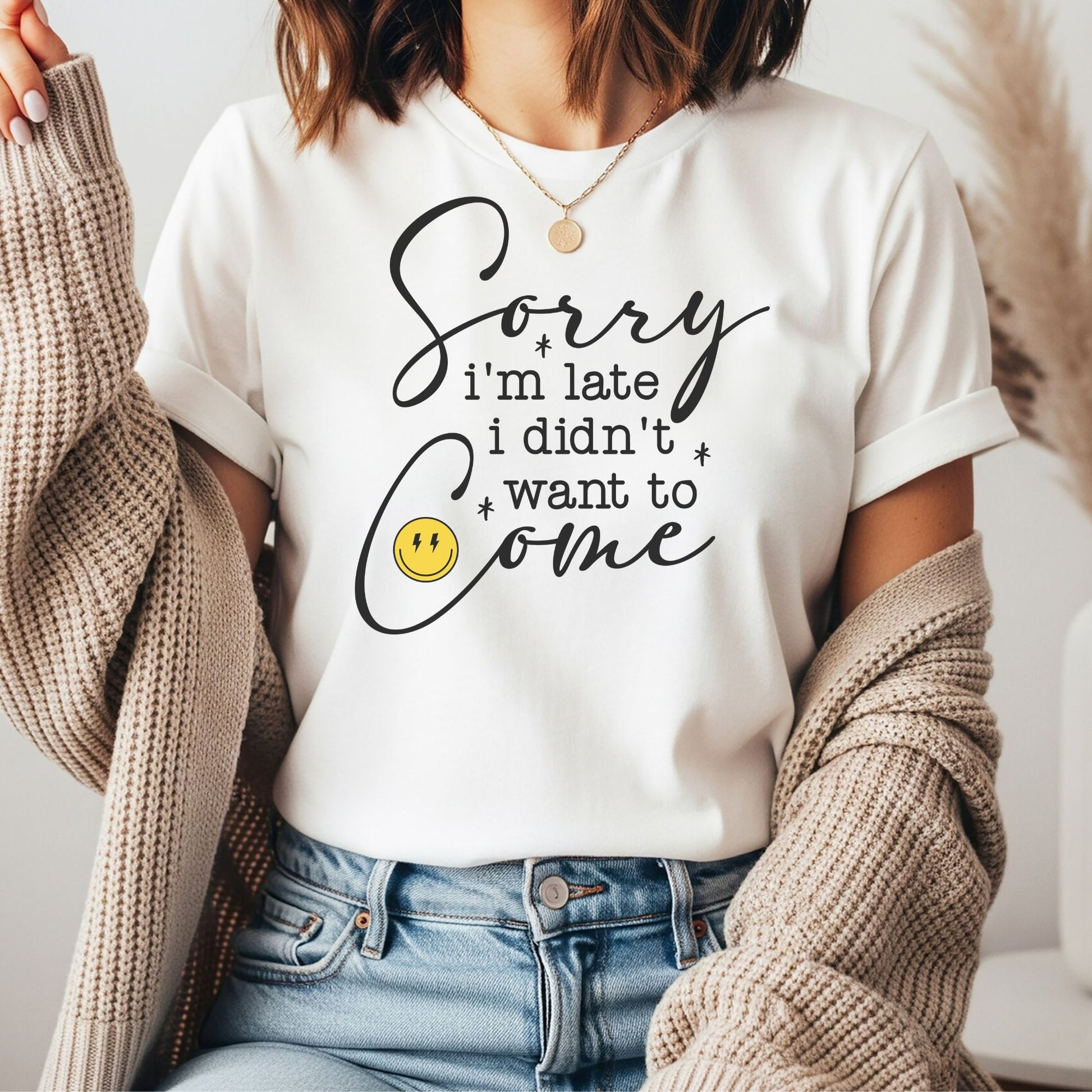 Funny Sorry I'm Late I Didn't Want to Come graphic featuring modern typography and a smiley face. Perfect for introverts, socially awkward friends, sarcastic humor lovers, and casual graphic tees or hoodies.