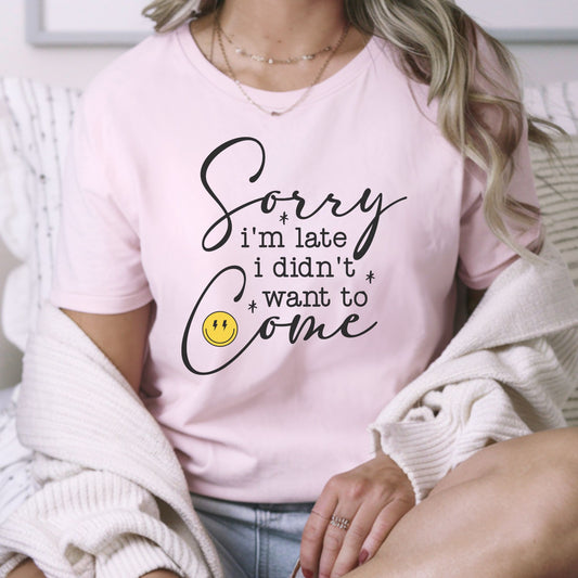 Sorry I’m Late I Didn’t Want to Come DTF transfer featuring black handwritten and typewriter-style lettering with a yellow lightning bolt smiley face for funny introvert shirts, sarcastic sweatshirts, tote bags, and graphic apparel.