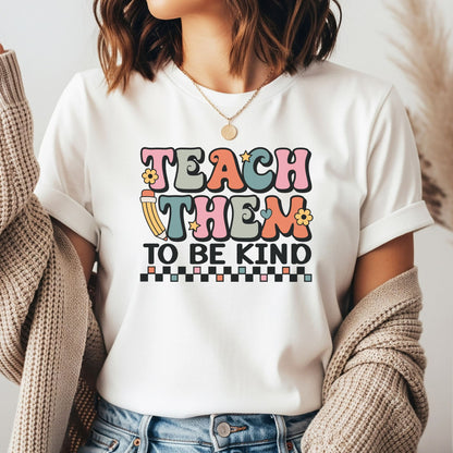 Teach Them to Be Kind DTF transfer featuring retro multicolor lettering, a pencil, flowers, stars, hearts, and a black checkerboard accent.