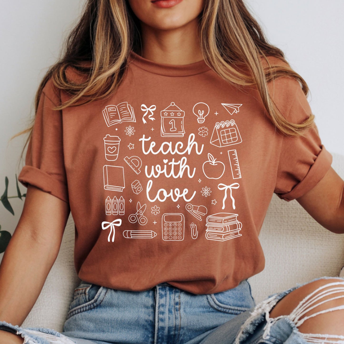 Teach With Love teacher design featuring clean white lettering surrounded by school doodles including books, bows, coffee, apple, ruler, crayons, scissors, calculator, pencil, and classroom supplies.