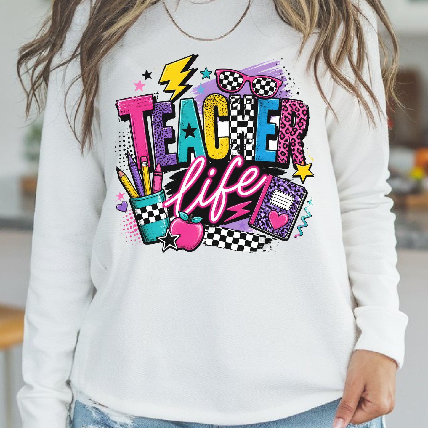 Teacher Life design featuring bold colorful lettering with checkerboard and leopard print patterns, sunglasses, lightning bolt, pencils, notebook, apple, stars, hearts, and bright retro school supplies.